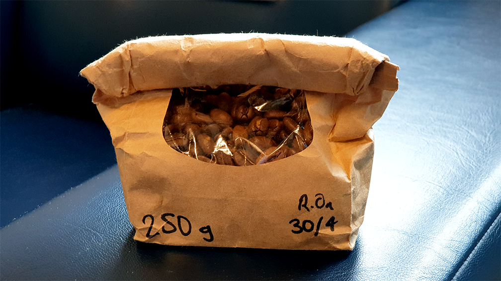 an image of a bag of coffee with a roasted on date.